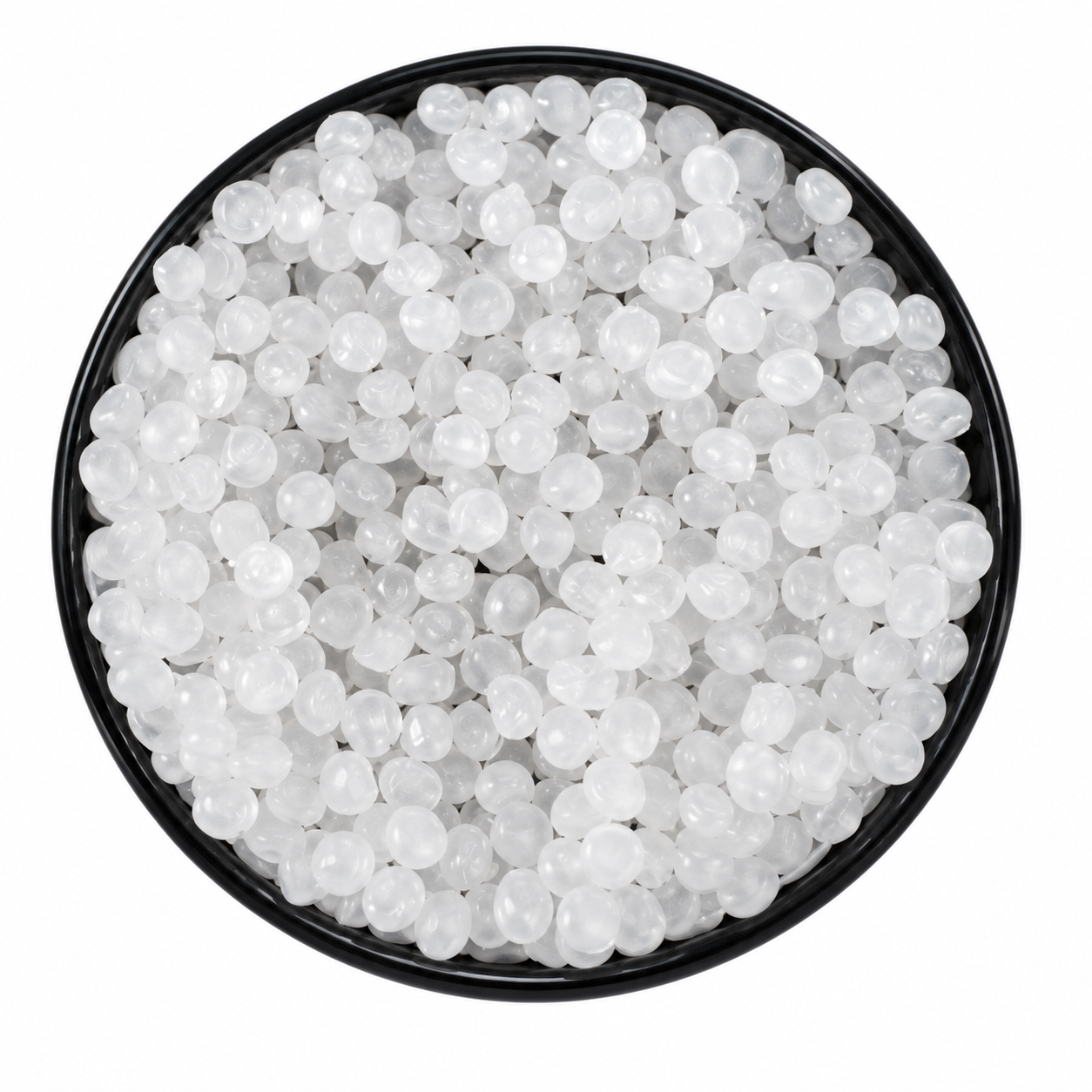 Polypropylene granules in a black dish